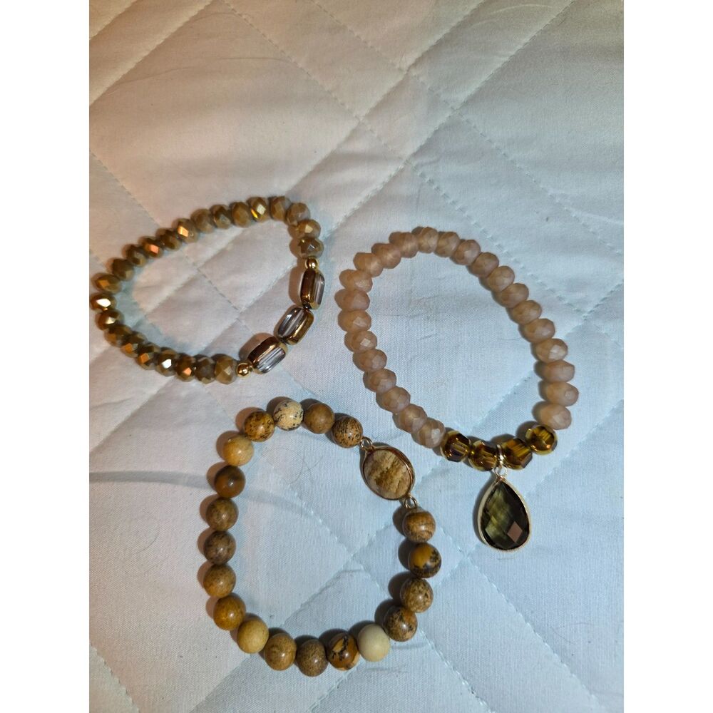 Trio of earthy, natural stone beaded bracelets.